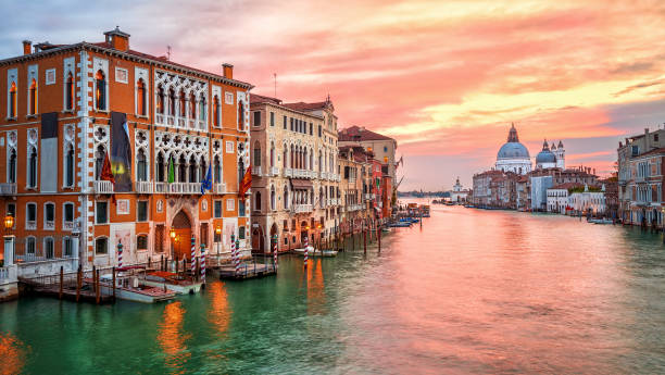 Sunrise on Canal Grande in Venice, Italy Dramatic sunrise on Canal Grande in Venice, Italy grand canal venice stock pictures, royalty-free photos & images