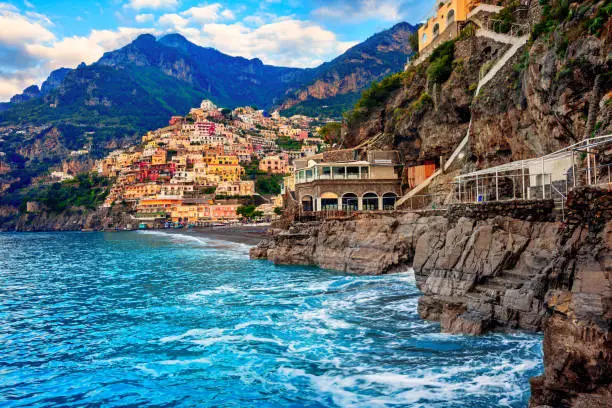 Positano, a cliffside village on Amalfi coast, Naples, Italy, dramatically set between rocks on Mediterranean sea