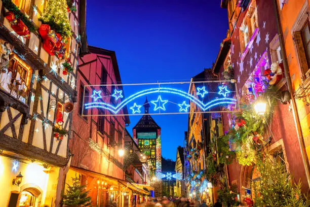 Festive Christmas illumination in the historical Old town of Riquewihr, Alsace, France