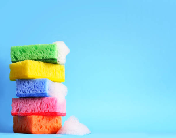 istock sponges cleaning kit isolated on blue background 1315227402