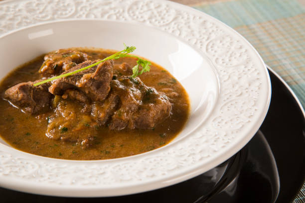 istock Rustic Stew meat with sauce in the white plate 1315227413