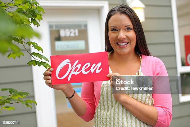 A Portrait Of A Small Business Owner Holding An Open Sign Stock Photo - Download Image Now