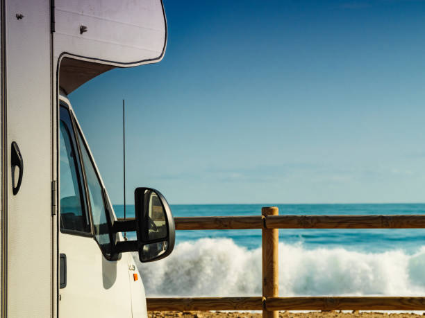 istock Rv motor home camping on beach 1315227604