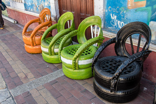 Guano, Riobamba, Ecuador - oct 17, 2018: Old tires are recycled and reused to create nice garden chairs, in Guano, near Riobamba