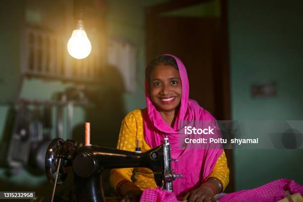 Portrait Of A Rural Woman Sewing Clothes Stock Photo - Download Image Now - India, Culture of India, Indian Ethnicity