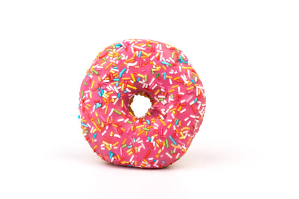 istock Fresh made Donuts isolated on white background. Doughnuts are traditional sweet pastries. Copy space for text. 1315236110