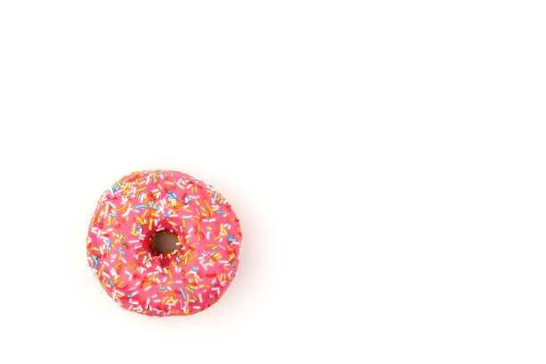 istock Fresh made Donuts isolated on white background. Doughnuts are traditional sweet pastries. Copy space for text. 1315236111
