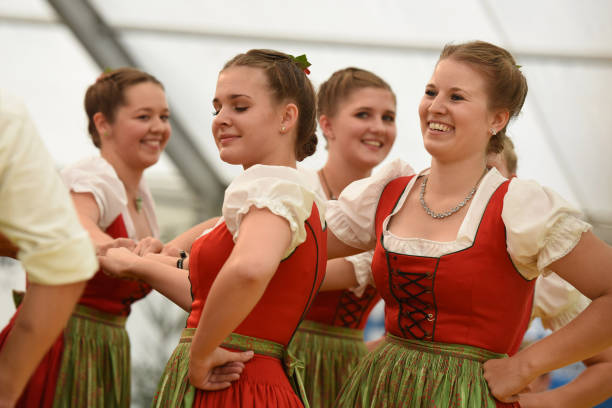 traditional austrian folk dance - dirndl traditional clothing austria traditional culture imagens e fotografias de stock