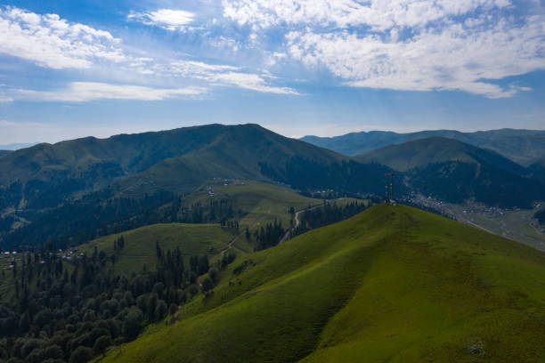 istock Mountains and green grass view from drone 1315239001