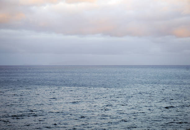Stormy clouds over dark ocean