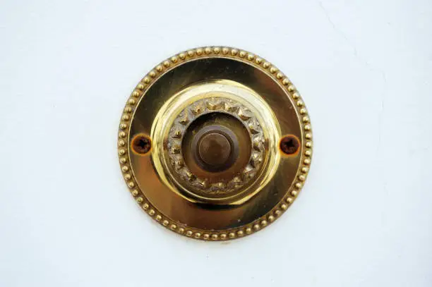Photo of Old brass doorbell button