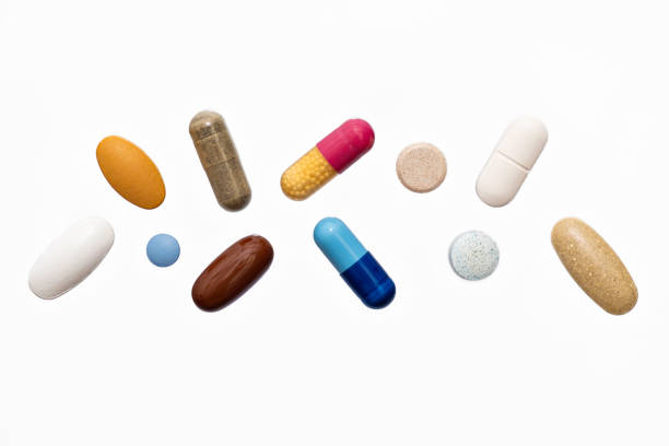 istock colorful powder soft capsules pill vitamin supplements on white background 1315241722