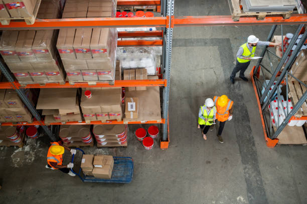 istock Above view of warehouse staff at work 1315247047