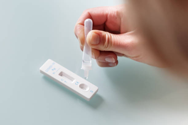 istock Drop of a test material in a rapid test cassettee  for covid-19 antigen test. 1315249201