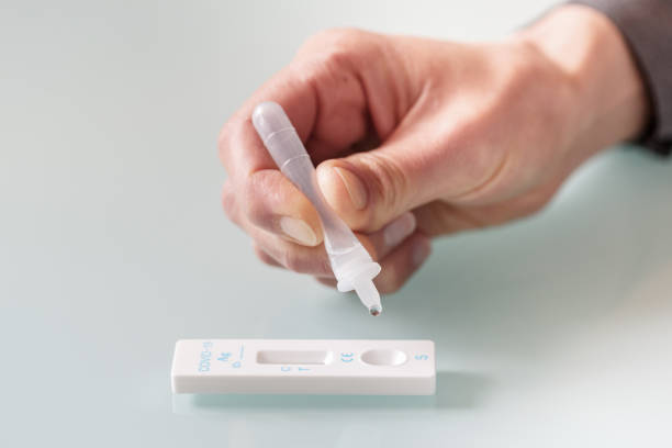 istock Drop of a test material in a rapid test cassettee  for covid-19 antigen test. 1315249204