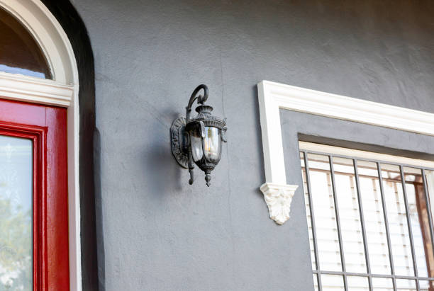Closeup old house with electric lamp, background with copy space, horizontal composition