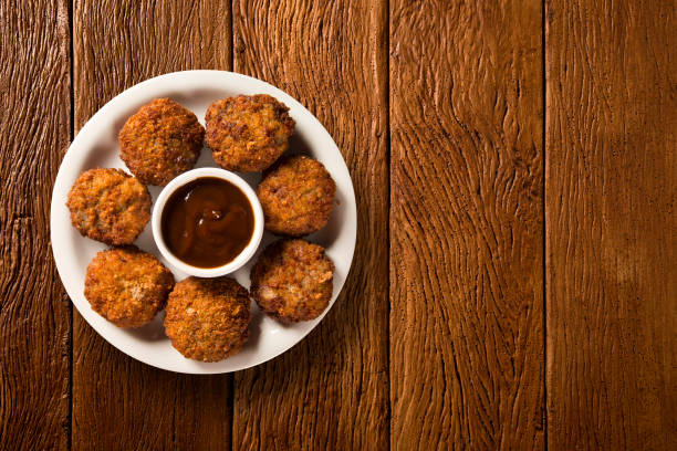 istock Rice ball fried on wood background 1315251764