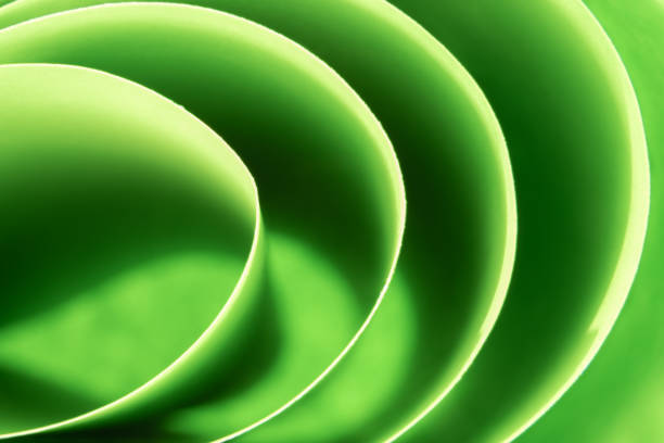 istock Abstract green colored background with curved lines and shapes 1315252696