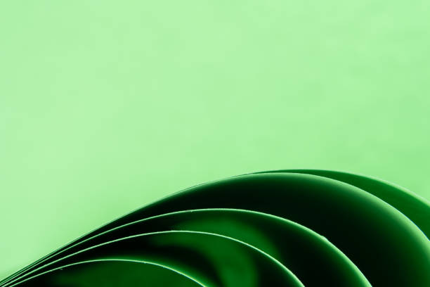 istock Abstract green colored background with curved lines and shapes 1315252917