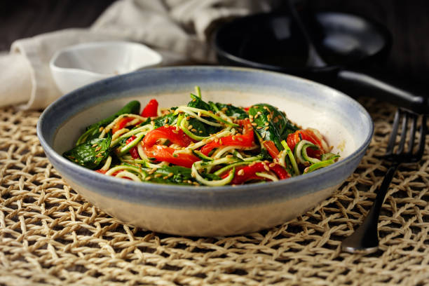 istock Vegan courgette noodle with roasted pepper salad 1315254104