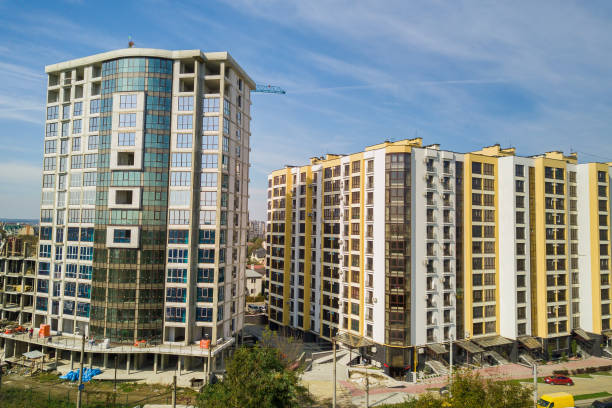 istock High residential apartment building under construction. Real estate development. 1315258046