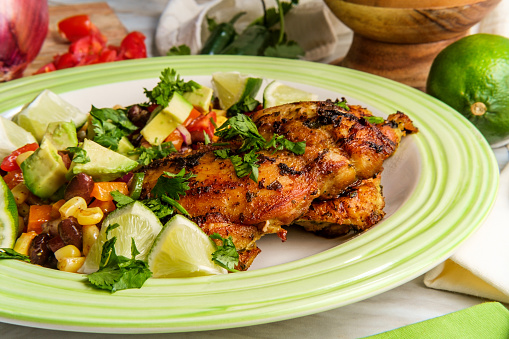 Mexican cilantro lime chicken thighs with black bean and corn salad