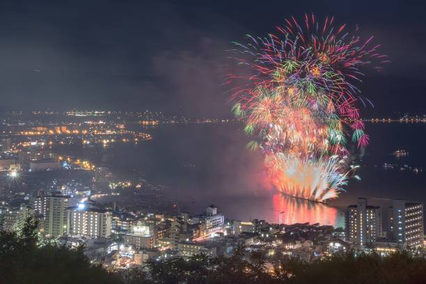 Fireworks of National new fireworks competition in Nagano prefecture, Japan This is the photograph of the fireworks of National new fireworks competition in Nagano prefecture, Japan.
This famous fireworks festival is very popular, about 300,000 people come to see this fireworks every september. suwa lake photos stock pictures, royalty-free photos & images
