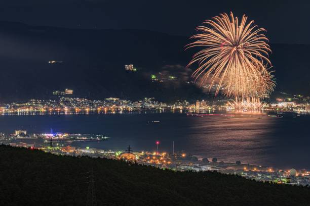 Fireworks of National new fireworks competition in Nagano prefecture, Japan This is the photograph of the fireworks of National new fireworks competition in Nagano prefecture, Japan.
This famous fireworks festival is very popular, about 300,000 people come to see this fireworks every september. suwa lake photos stock pictures, royalty-free photos & images