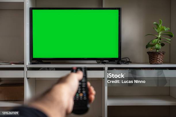 Remote Control And Lcd Screen Tv Chroma Key Stock Photo - Download Image Now - Television Set, Television Industry, Watching TV