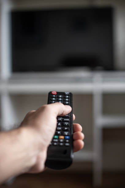 istock Remote control and TV - Black Screen - TV turn off 1315261169