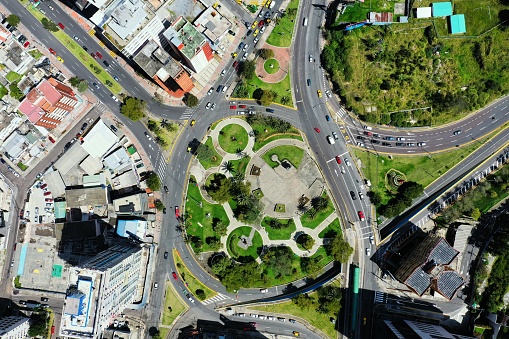 Aerial top down view of a large and busy roundabout in Quito, Ecuador