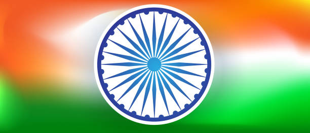 istock Ashoka wheel on blurred gradient tricolor india flag background 1315267866