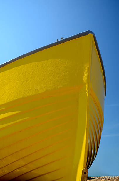 istock Yellow boat on the beach 131527717