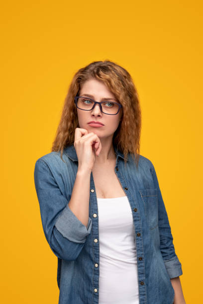 istock Thoughtful young woman looking away 1315288709