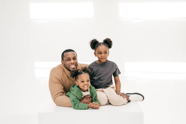 istock Family portrait -dad and two daughters 1315289578