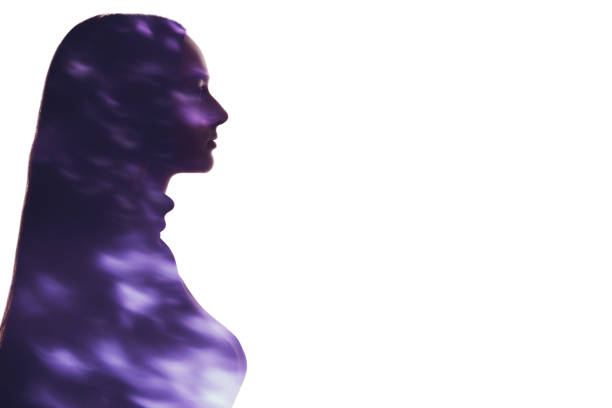 istock double exposure silhouette neon purple fleck woman 1315289914