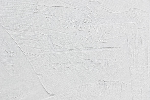 istock White plastered wall texture with strokes and lines on decorative stucco 1315293242