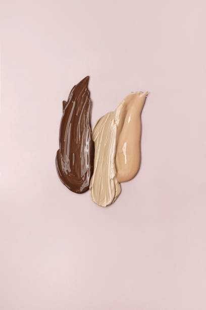 istock Smears of foundation on a beige background. 1315300738
