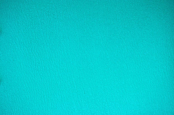 istock A background image of genuine leather artificially colored in monochrome light blue, with characteristic fine wrinkles. 1315300813