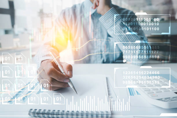 istock Businessmen are analyzing graphs and taking notes with charts and graphs in the office.Business analysis, modern technology concept. 1315302306