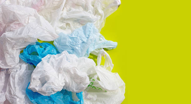 istock Crumpled plastic bags on green background. 1315304100