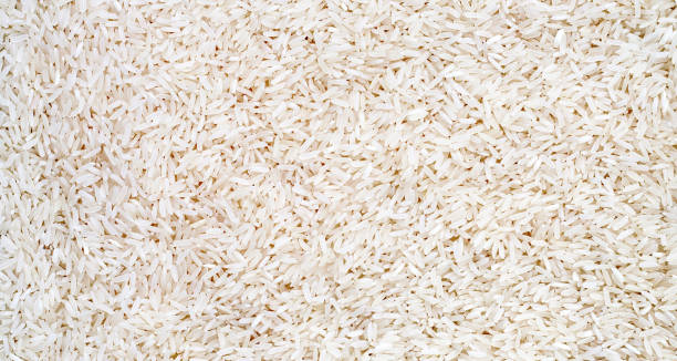 istock Close up shot of raw rice background. 1315304715
