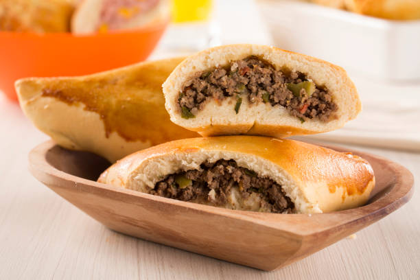 istock Brazilian snack. Meat Esfiha on the table 1315309091