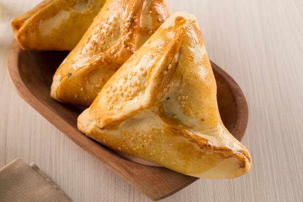 istock Brazilian snack. Meat Esfiha on the table 1315309175
