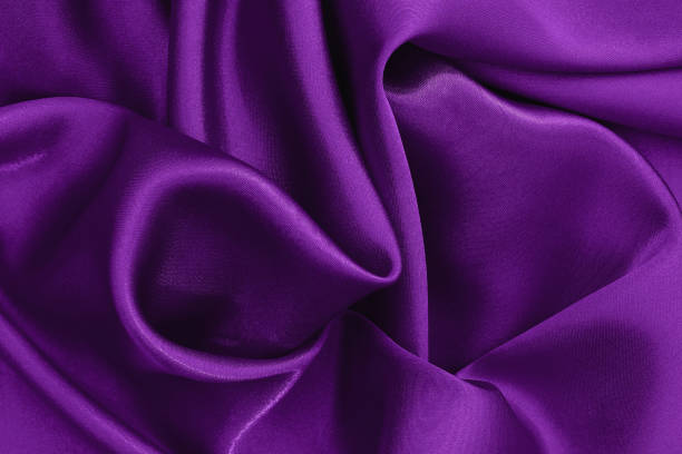istock Dark purple fabric texture background, detail of silk or linen pattern. 1315310017