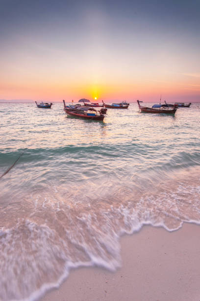 Beautiful sunset beach in the evening at andaman sea, Koh Lipe, Thailand Beautiful sunset beach in the evening at andaman sea, Koh Lipe, Thailand andaman sea stock pictures, royalty-free photos & images