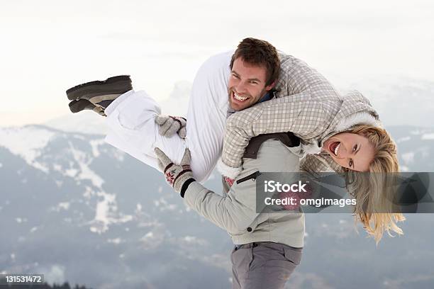 Young Couple On Winter Vacation Stock Photo - Download Image Now - 20-29 Years, 25-29 Years, Adult