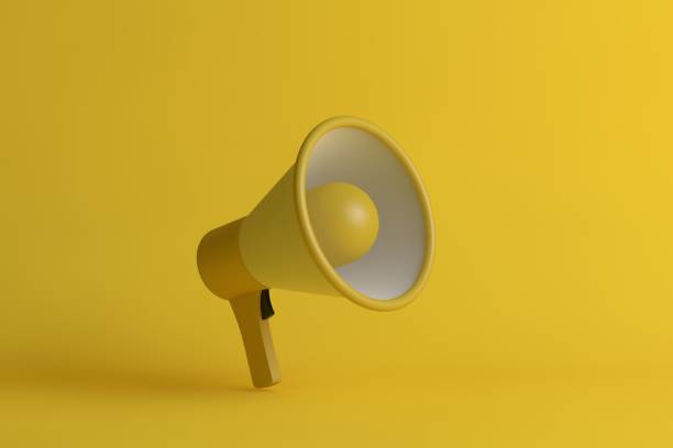 istock 3D Yellow Megaphone on Yellow Background 1315315467