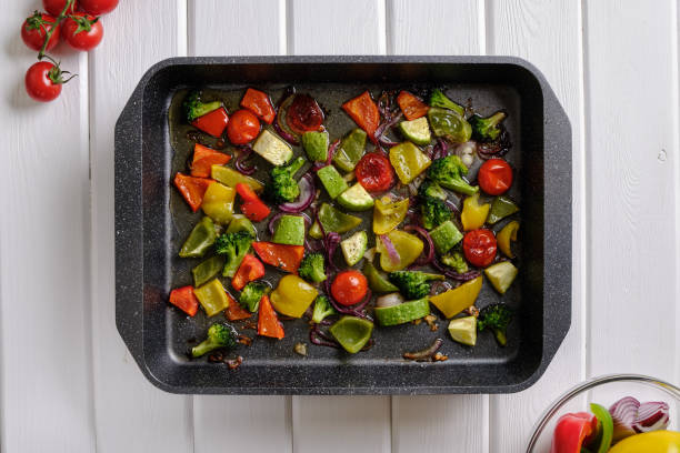 istock Delicious and useful food. Grilled vegetables in the form for baking on a white rustic table 1315322478