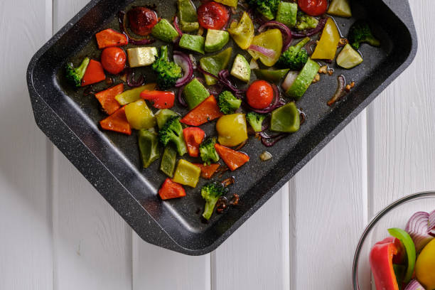 istock Delicious and useful food. Grilled vegetables in the form for baking on a white rustic table 1315322488
